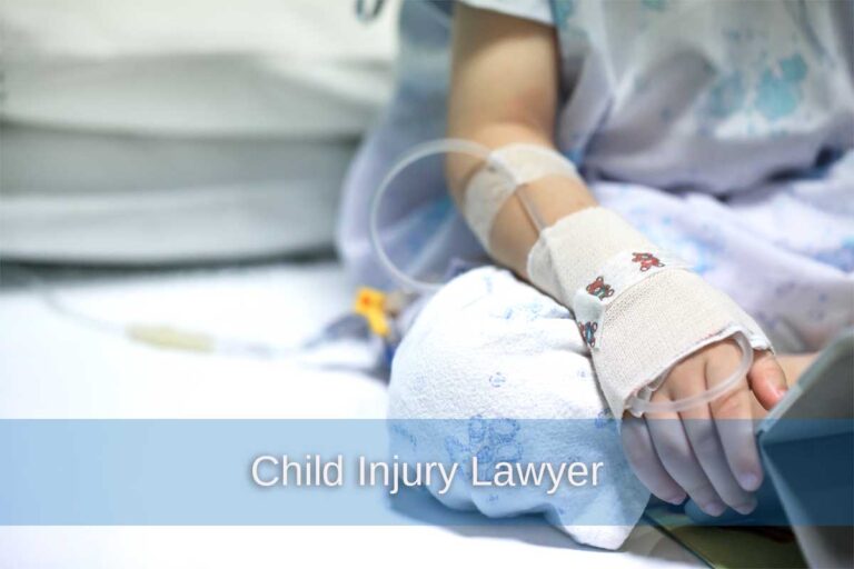 A child with a bandaged arm is seated on a bed with a laptop, representing the role of a child injury lawyer in recovery.