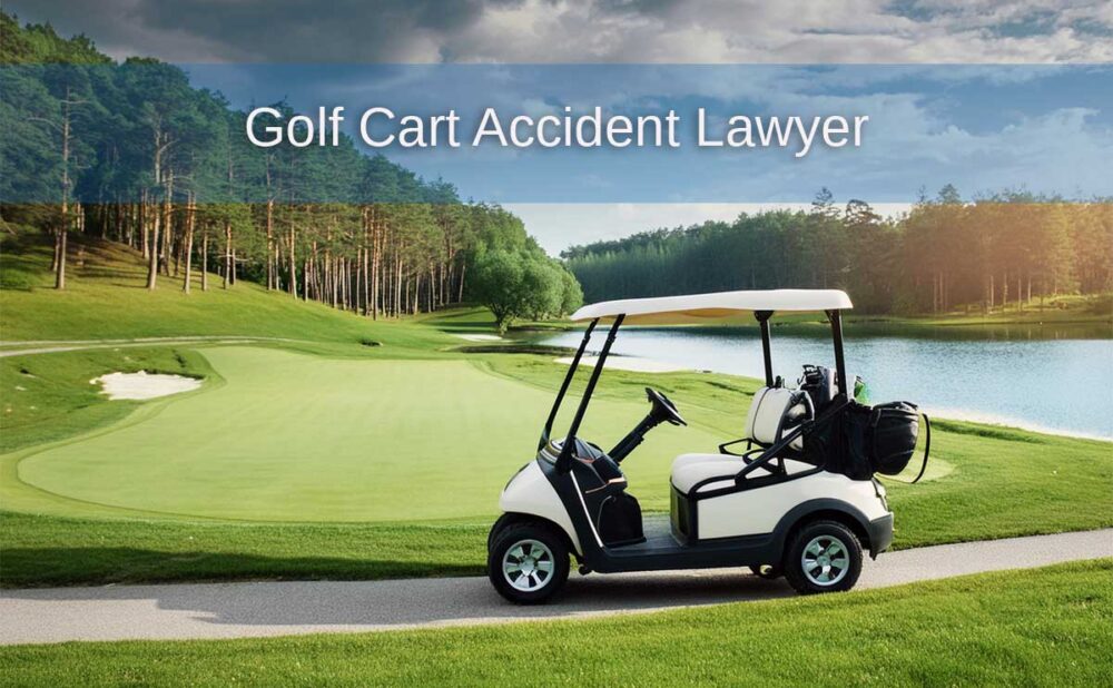 A parked golf cart on green grass, emphasizing the significance of hiring a lawyer for golf cart accident cases.