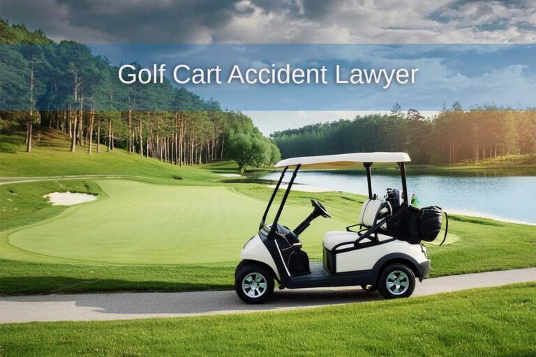 A parked golf cart on green grass, emphasizing the significance of hiring a lawyer for golf cart accident cases.