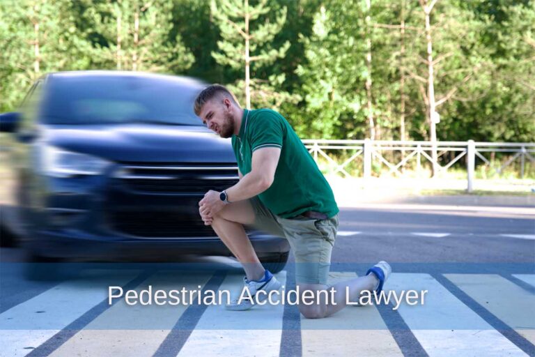 A man kneels on the road after being hit with a car, emphasizing the importance of legal support for pedestrian accidents.