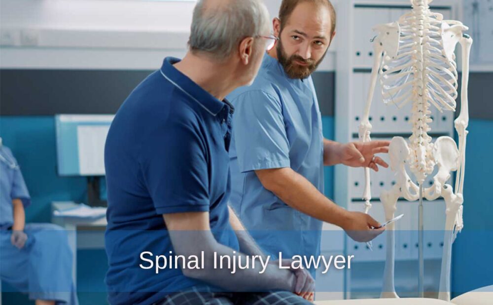 A man discusses spinal injuries with a doctor, emphasizing the need for medical and legal guidance.