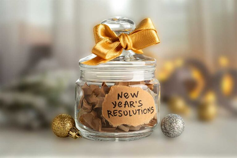 A New Year's resolutions jar embellished with a gold ribbon, highlighting key commitments for injury prevention in the New Year.