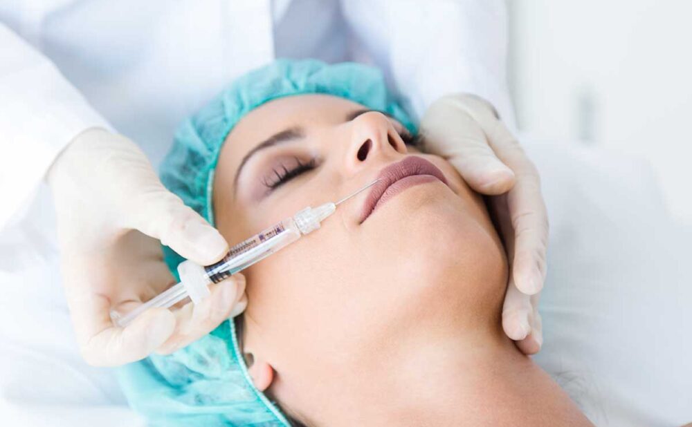 Close up showing a woman receiving a Botox facial treatment, highlighting the importance of safety in cosmetic procedures.