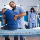 Doctor examines a patient with back pain, highlighting the unique methods for treating musculoskeletal issues between chiropractors and orthopedic doctors.