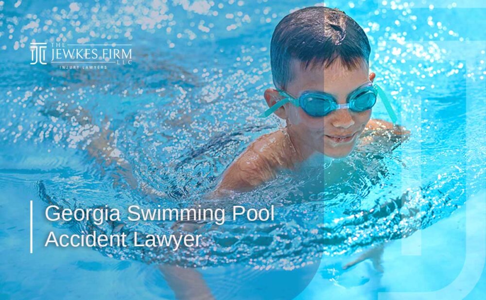 Boy swimming underwater in a pool wearing goggles, representing a Georgia swimming pool accident lawyer.