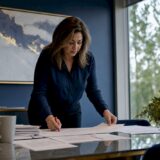 Claims adjuster reviewing accident reports