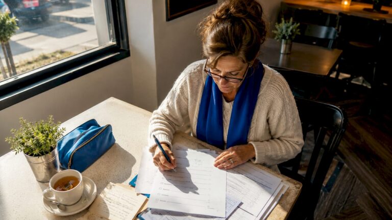 Woman organizing personal injury checklist documents