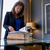 Attorney reviewing medical malpractice documents