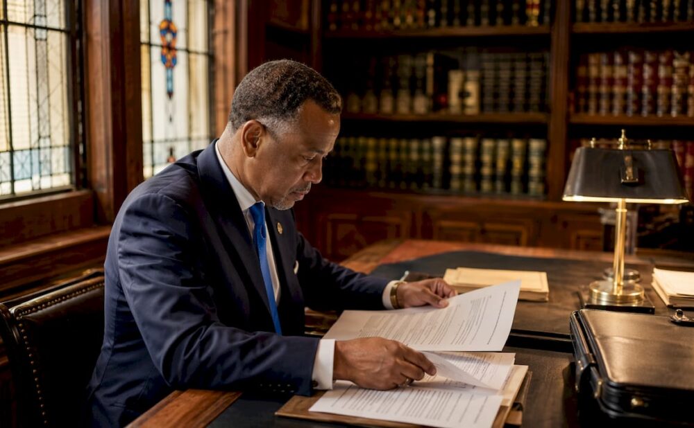 Lawyer reviewing court documents in office