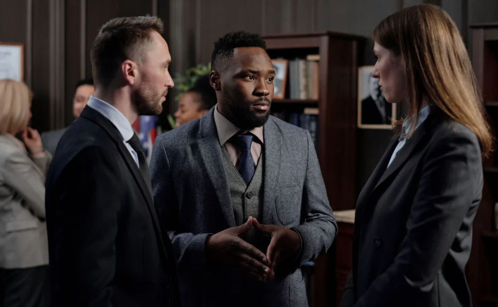 Attorney discussing settlement versus trial options with a medical malpractice client in Georgia.