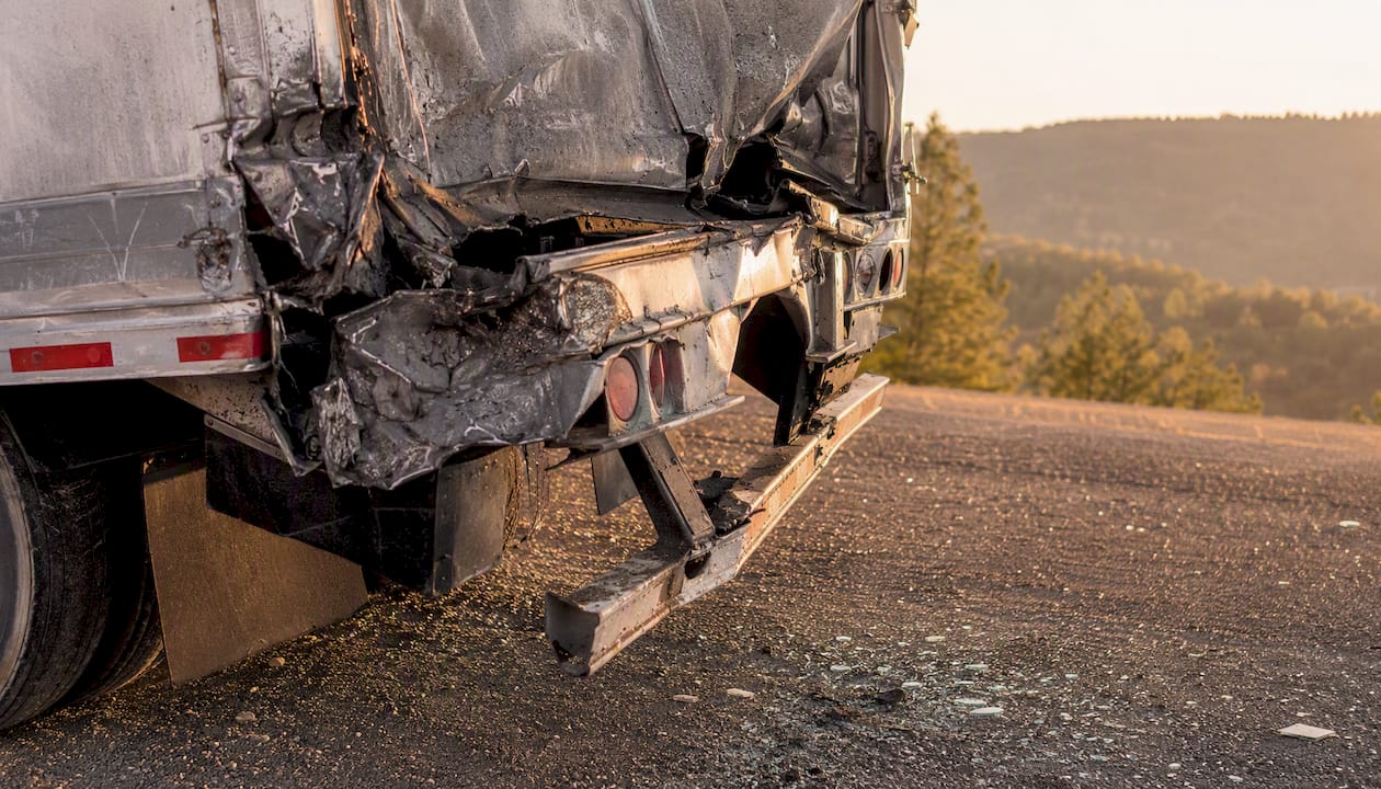 Damaged commercial truck side close-up