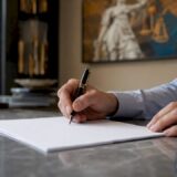 Client signing legal fee agreement
