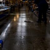 Wet grocery store floor with no warning sign