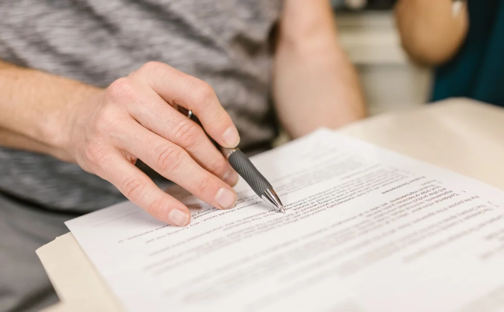 Personal injury attorney reviewing medical records and accident evidence