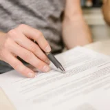 Personal injury attorney reviewing medical records and accident evidence