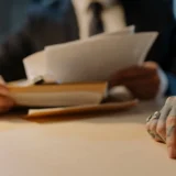 Lawyer preparing evidence for a workers compensation hearing